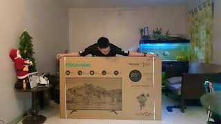 Unboxing and Installation of Hisense 65 UHD Smart TV [upl. by Erskine]